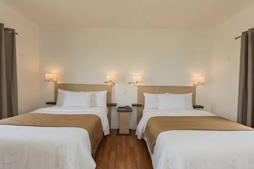 Imagen de la habitación del Motel Au Fleuve D'argent. Foto 6