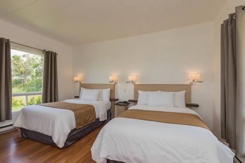 Imagen de la habitación del Motel Au Fleuve D'argent. Foto 7