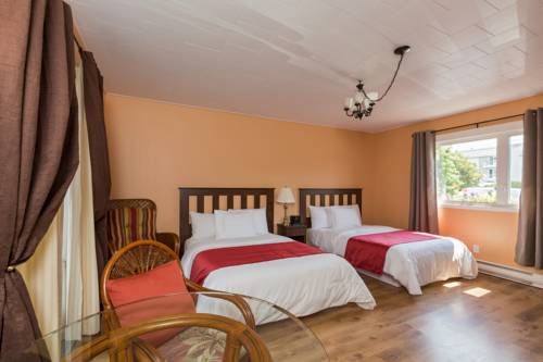 Imagen de la habitación del Motel Au Fleuve D'argent. Foto 9