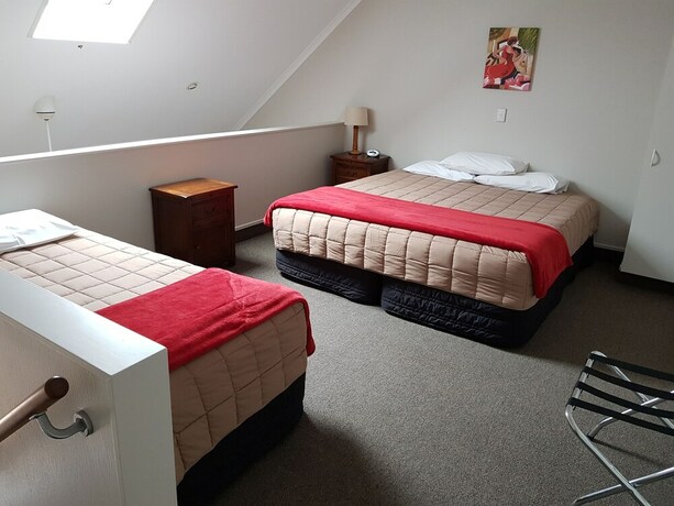 Imagen de la habitación del Motel Bay Palm. Foto 12