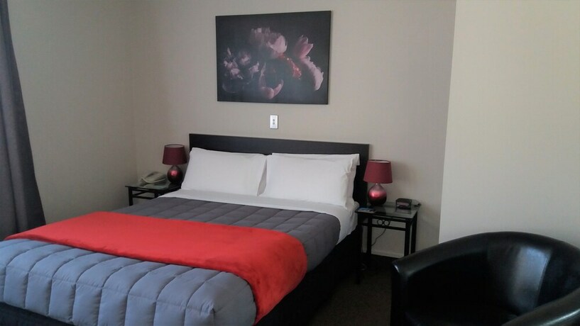 Imagen de la habitación del Motel Bay Palm. Foto 13