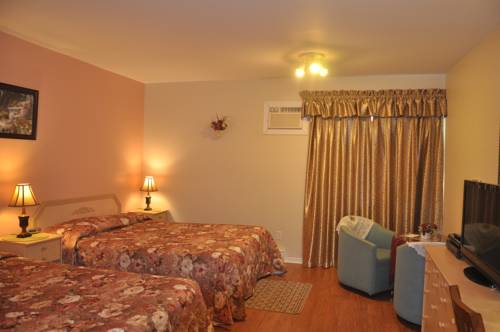 Imagen de la habitación del Motel Bel-eau. Foto 11