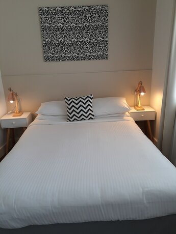 Imagen de la habitación del Motel Belmont Palms. Foto 19