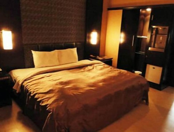 Imagen de la habitación del Motel Beveriy Garden. Foto 11