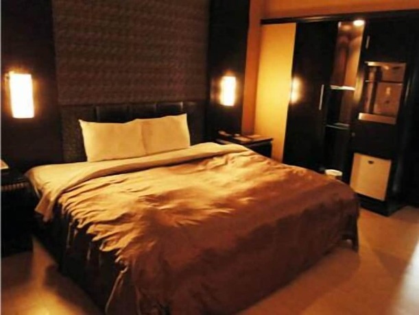 Imagen de la habitación del Motel Beveriy Garden. Foto 14