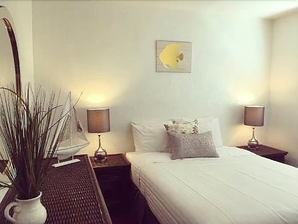 Imagen de la habitación del Motel Blind Pass Resort. Foto 18