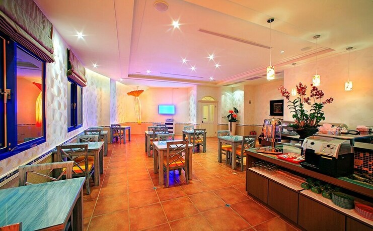 Imagen del bar/restaurante del Motel Blue Coast Spa. Foto 18