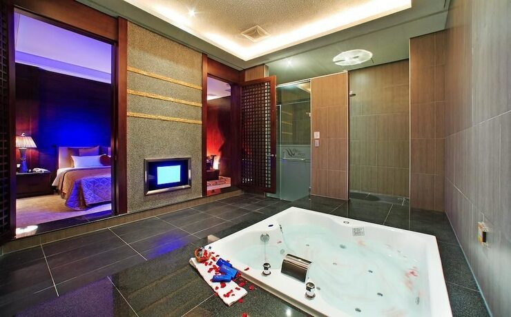 Imagen de la habitación del Motel Blue Coast Spa. Foto 23