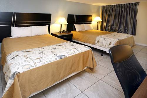 Imagen de la habitación del Motel Blue Marlin Inn and Suites. Foto 7