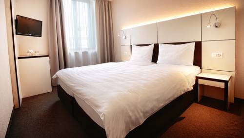 Imagen de la habitación del Motel B_smart Basel. Foto 4