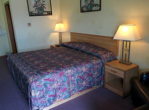 Imagen de la habitación del Motel Budget Host Stone's. Foto 1