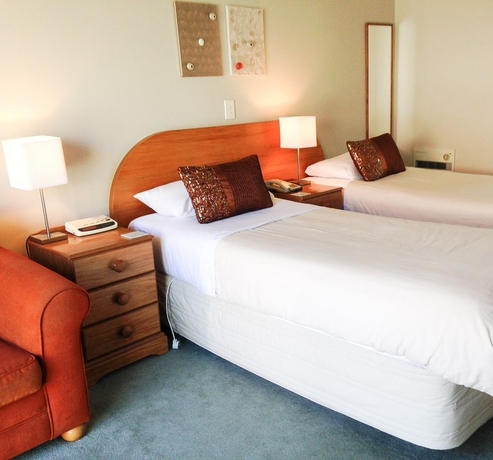 Imagen de la habitación del Motel Bush Inn Court. Foto 7