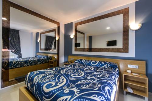Imagen de la habitación del Motel Cancún Avilés. Foto 2