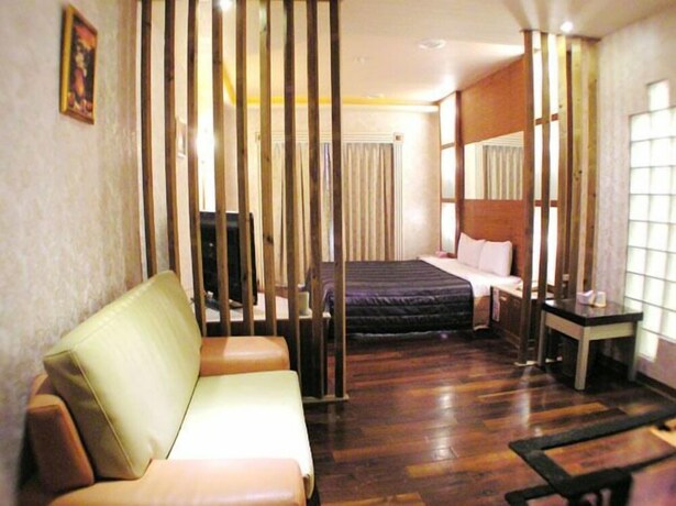 Imagen de la habitación del Motel Changsing Business. Foto 13