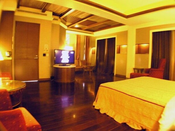 Imagen de la habitación del Motel Changsing Business. Foto 18