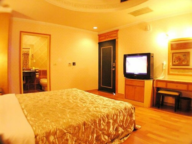 Imagen de la habitación del Motel Changsing Business. Foto 22