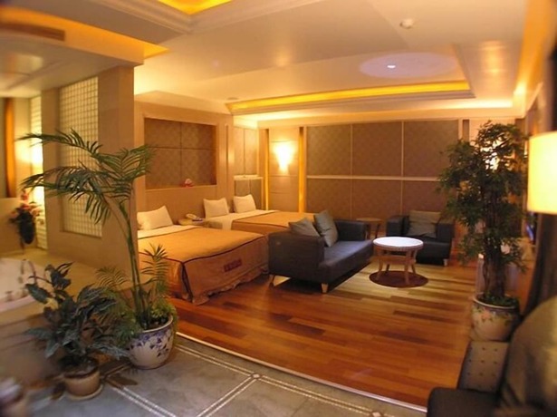 Imagen de la habitación del Motel Changsing Business. Foto 23