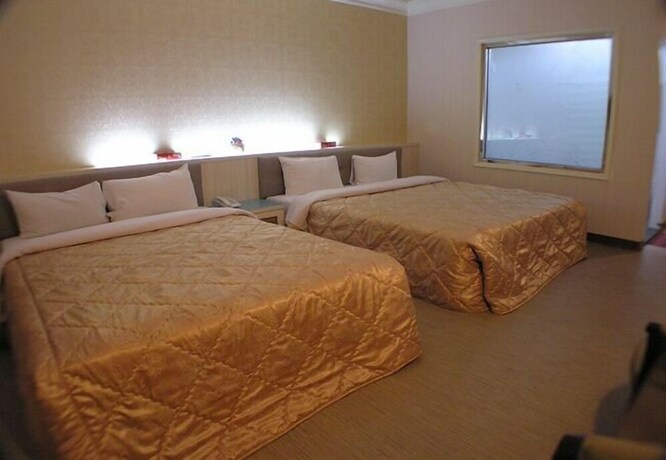Imagen de la habitación del Motel Changsing Business. Foto 29