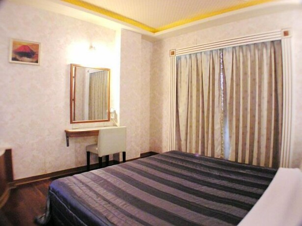 Imagen de la habitación del Motel Changsing Business. Foto 36