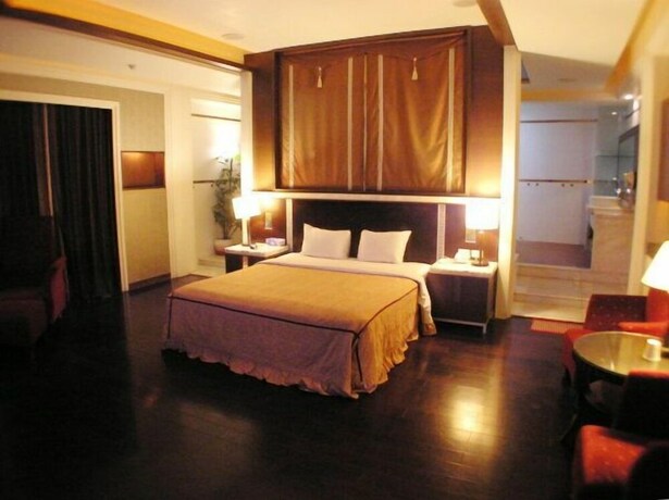 Imagen de la habitación del Motel Changsing Business. Foto 37