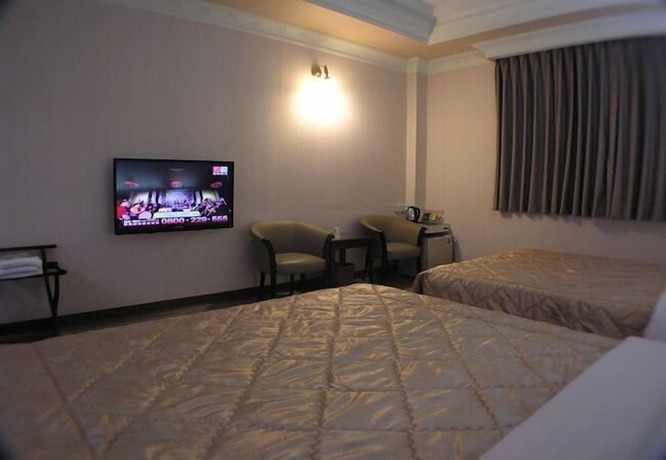 Imagen de la habitación del Motel Changsing Business. Foto 39