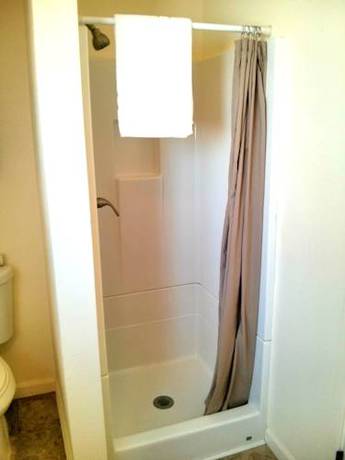 Imagen de la habitación del Motel Charm and Suites. Foto 5