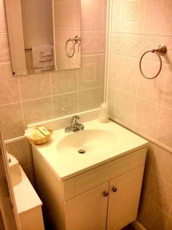 Imagen de la habitación del Motel Charm and Suites. Foto 15