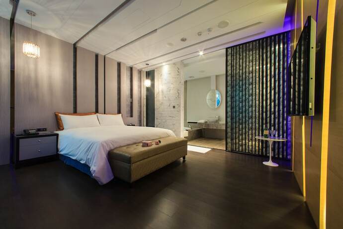 Imagen de la habitación del Motel Chen He Spa. Foto 15