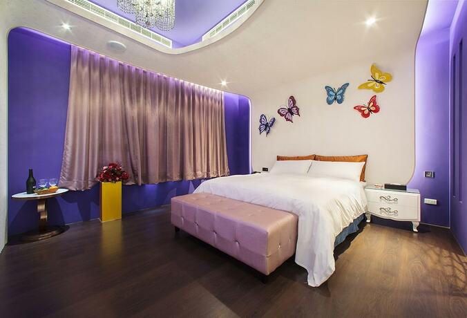 Imagen de la habitación del Motel Chen He Spa. Foto 16
