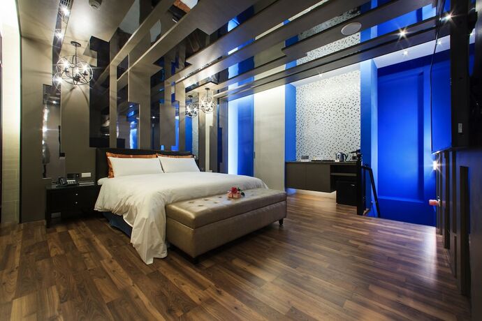 Imagen de la habitación del Motel Chen He Spa. Foto 20