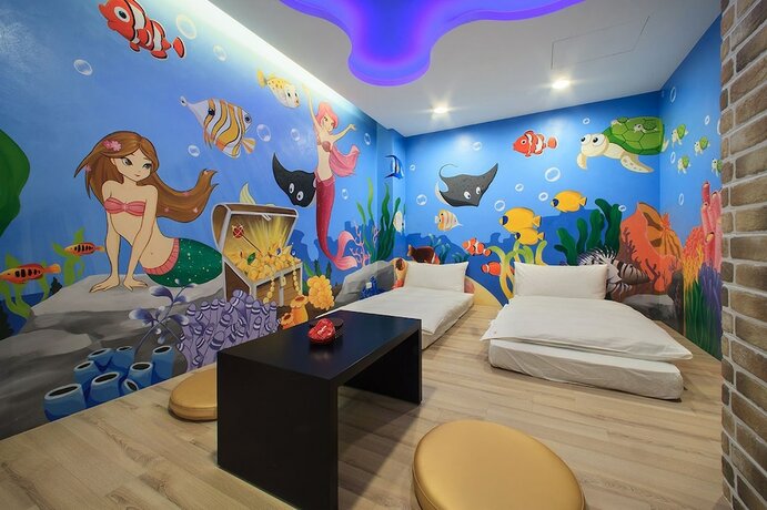 Imagen de la habitación del Motel Chen He Spa. Foto 22