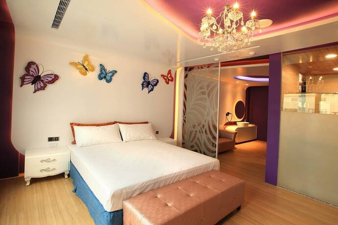 Imagen de la habitación del Motel Chen He Spa. Foto 27