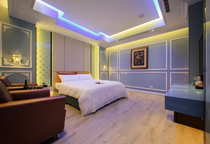 Imagen de la habitación del Motel Chen He Spa. Foto 28