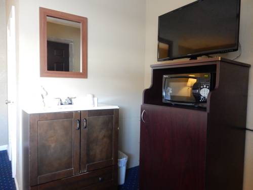 Imagen de la habitación del Motel Citilodge Suites &. Foto 11
