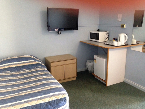 Imagen de la habitación del Motel City West. Foto 13