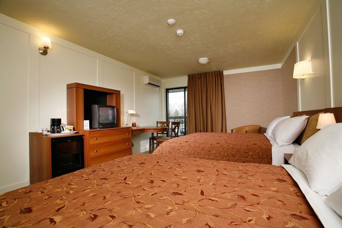 Imagen de la habitación del Motel Clarion Pointe La Malbaie. Foto 7