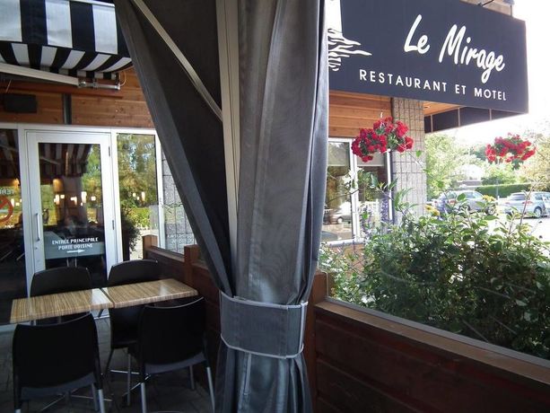 Imagen de la habitación del Motel Clarion Pointe La Malbaie. Foto 10