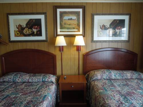 Imagen de la habitación del Motel Cocoa. Foto 1