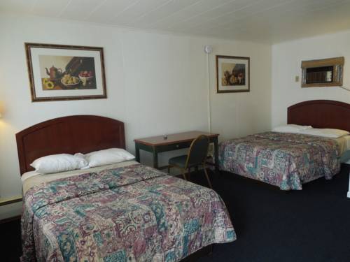 Imagen de la habitación del Motel Cocoa. Foto 4