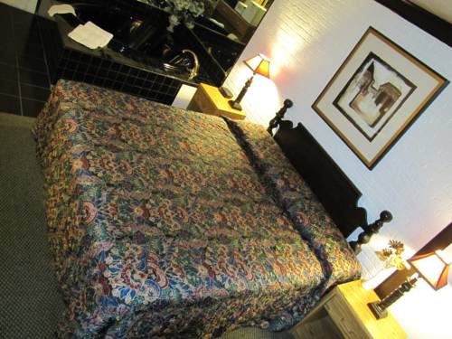 Imagen de la habitación del Motel Colonial Inn. Foto 3
