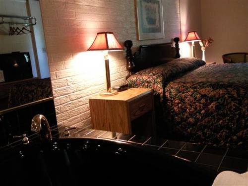 Imagen de la habitación del Motel Colonial Inn. Foto 11