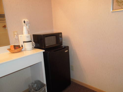 Imagen de la habitación del Motel Colonial Manor. Foto 11