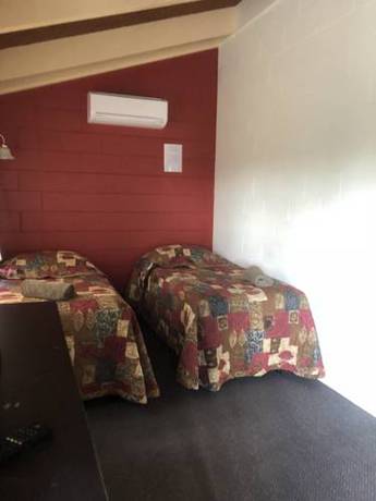 Imagen de la habitación del Motel Colonial Palms. Foto 1