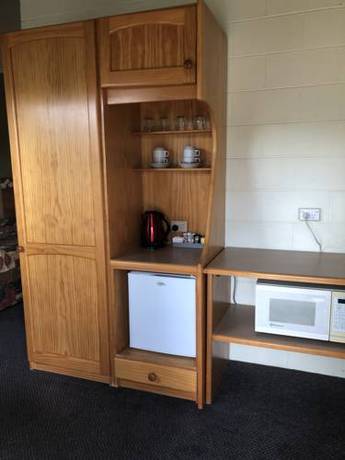 Imagen de la habitación del Motel Colonial Palms. Foto 4