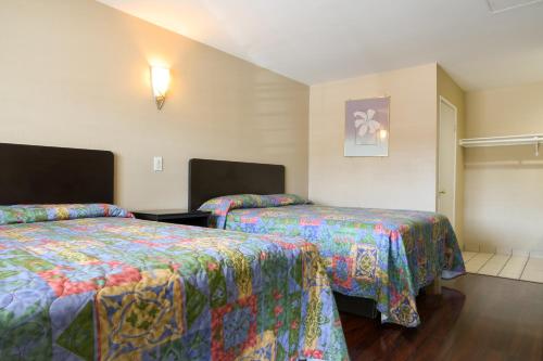 Imagen de la habitación del Motel Covina. Foto 8