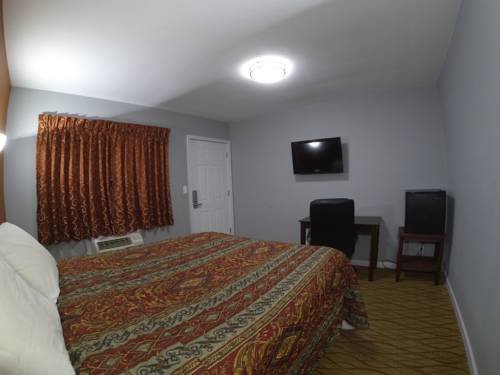 Imagen de la habitación del Motel Cozy Rest. Foto 13