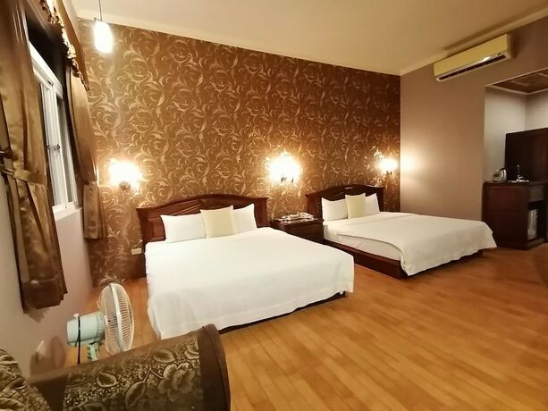 Imagen de la habitación del Motel Dibao. Foto 17