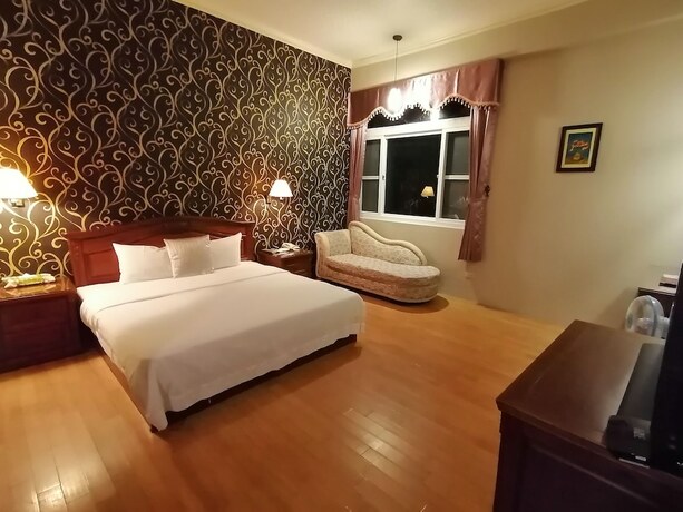 Imagen de la habitación del Motel Dibao. Foto 20