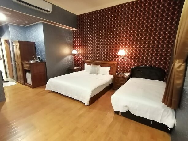 Imagen de la habitación del Motel Dibao. Foto 21