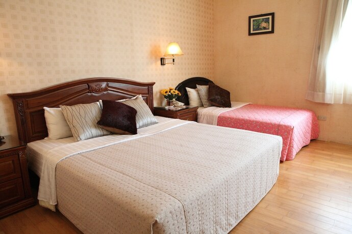 Imagen de la habitación del Motel Dibao. Foto 22